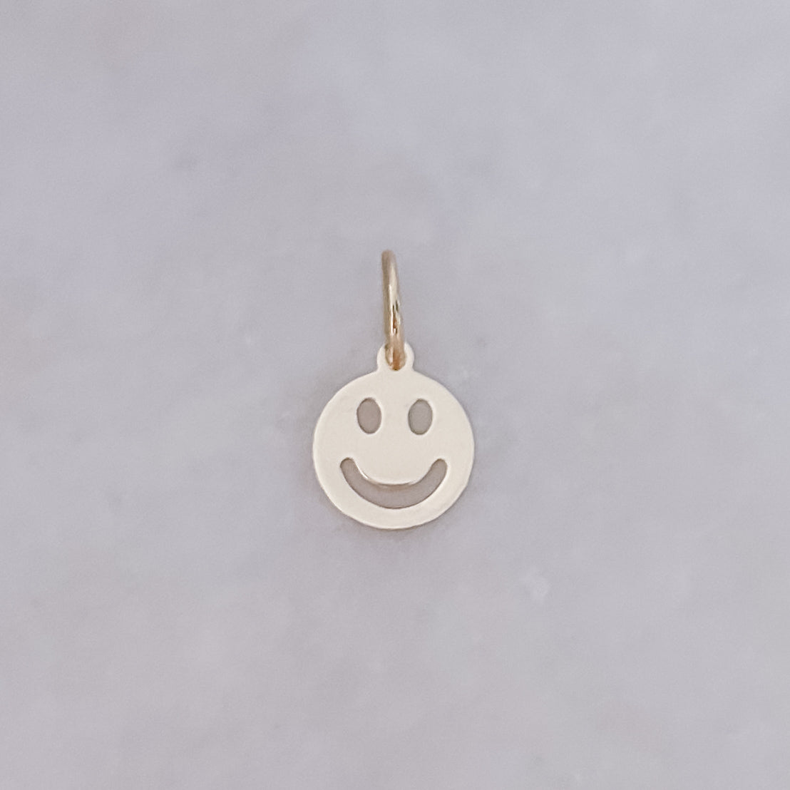 Goldener Smiley-Anhänger