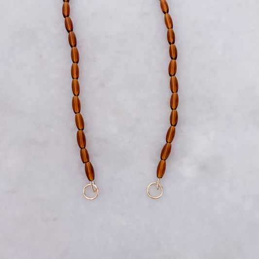Halskette mit braunen ovalen Perlen – 45 cm